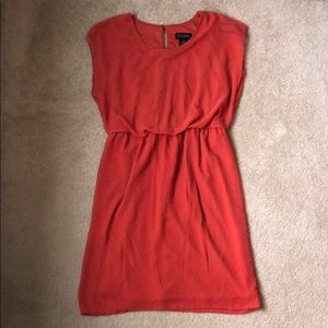 Beautiful burnt orange dress that’s so flattering!